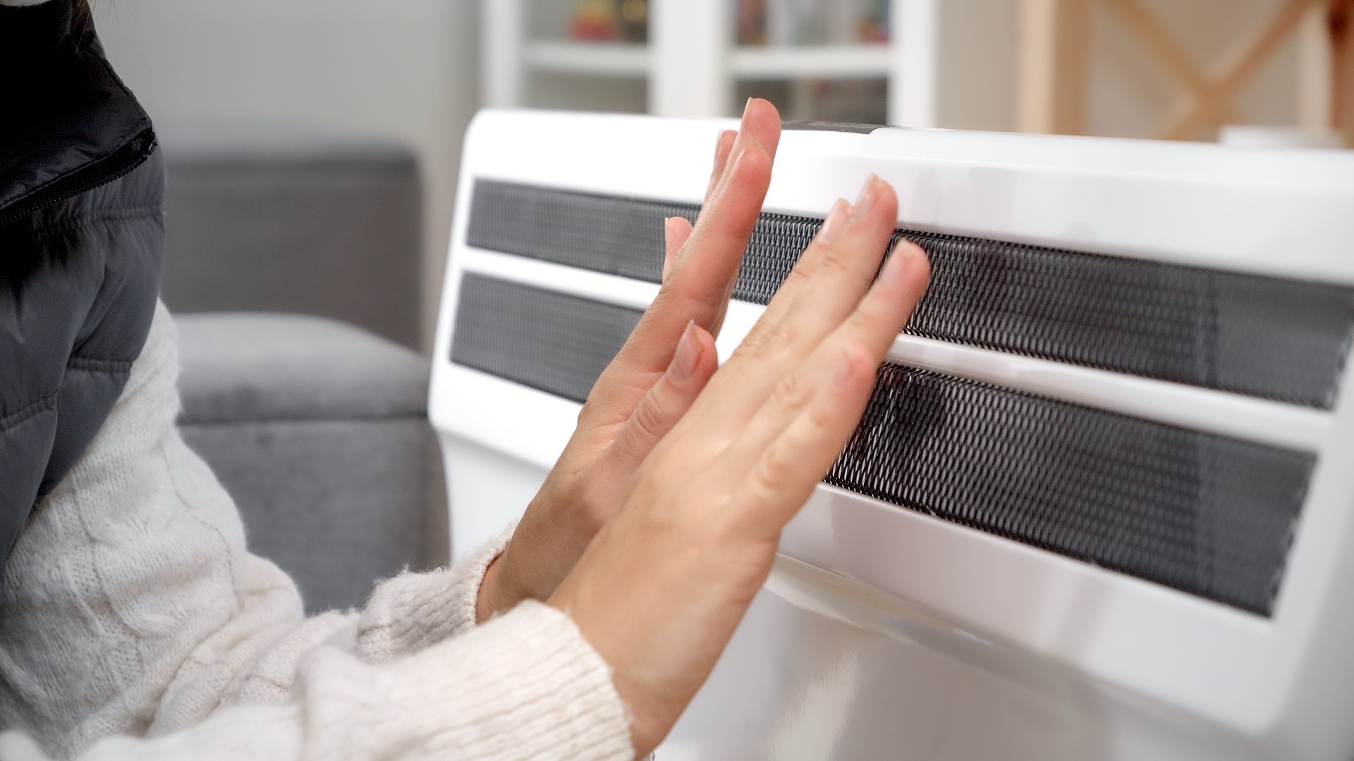 HVAC technician servicing heating system